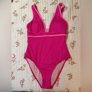 Vibrant Pink one  Piece Swimsuit for women with plunging neckline.